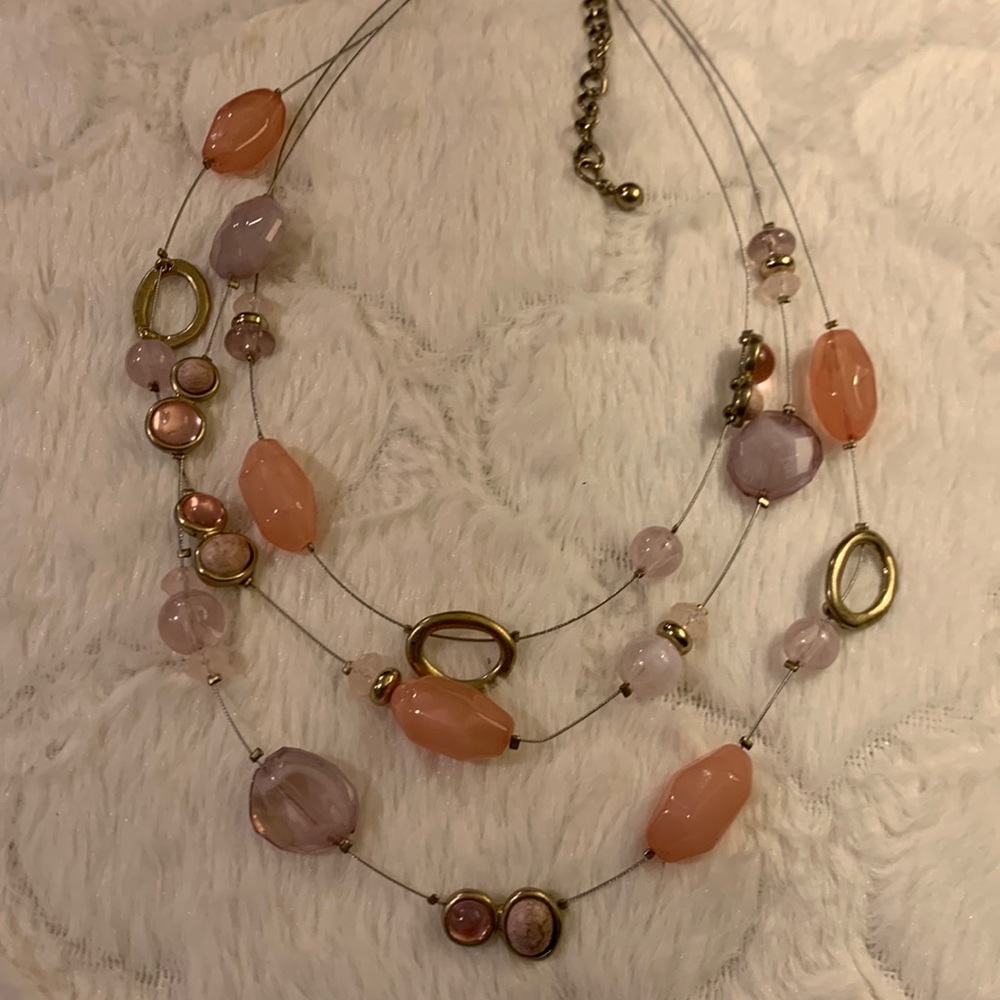 Light pink and soft purple on silver tone wire .chain!!! 3 layers!!